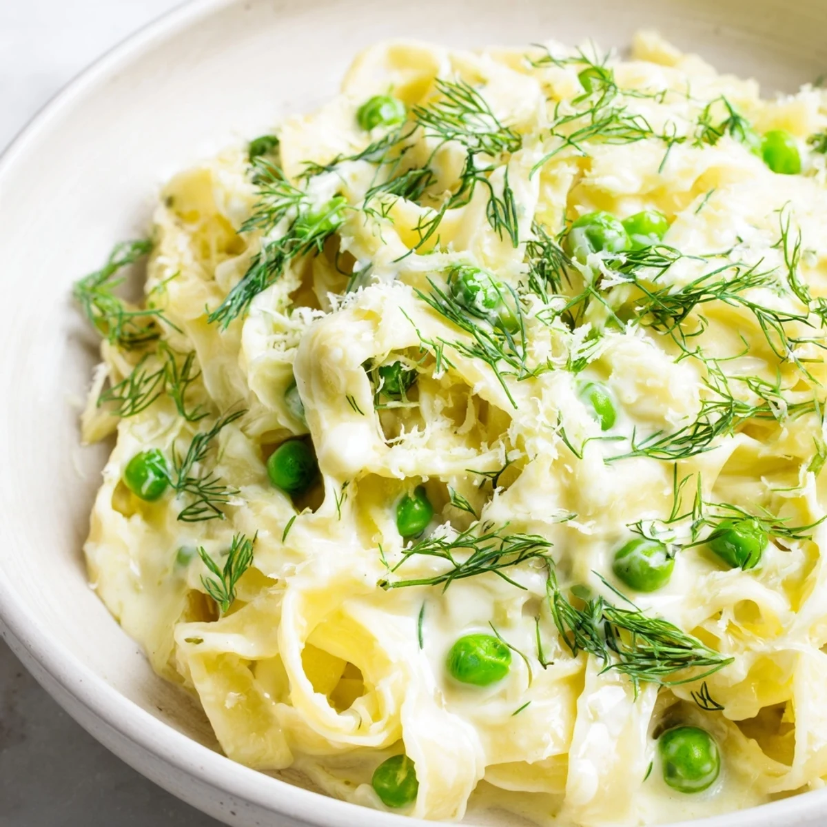 Close-up of the delicious Creamy Dill Pasta, featuring perfectly cooked pasta coated in a creamy, flavorful sauce.