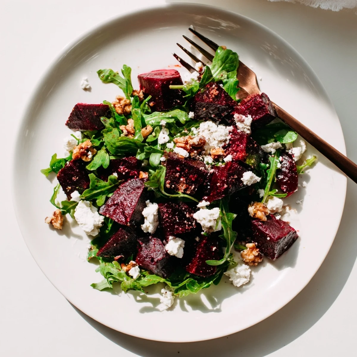 This easy vegetarian Roasted Beet Goat Cheese Salad features sweet roasted beets, tangy goat cheese, and a bright balsamic vinaigrette.  