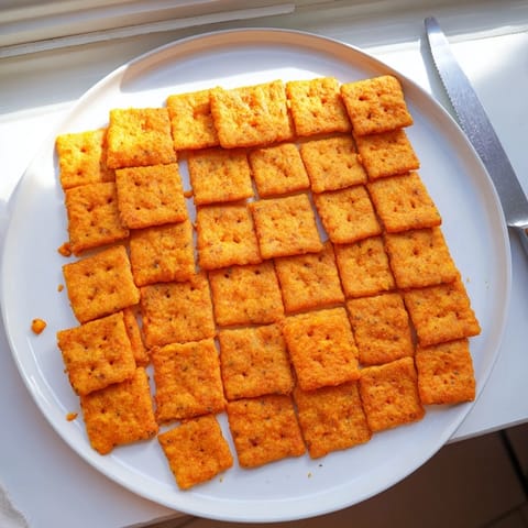 These easy homemade Crispy Cheeto Cheese Crackers are perfect for a party snack or movie night.  